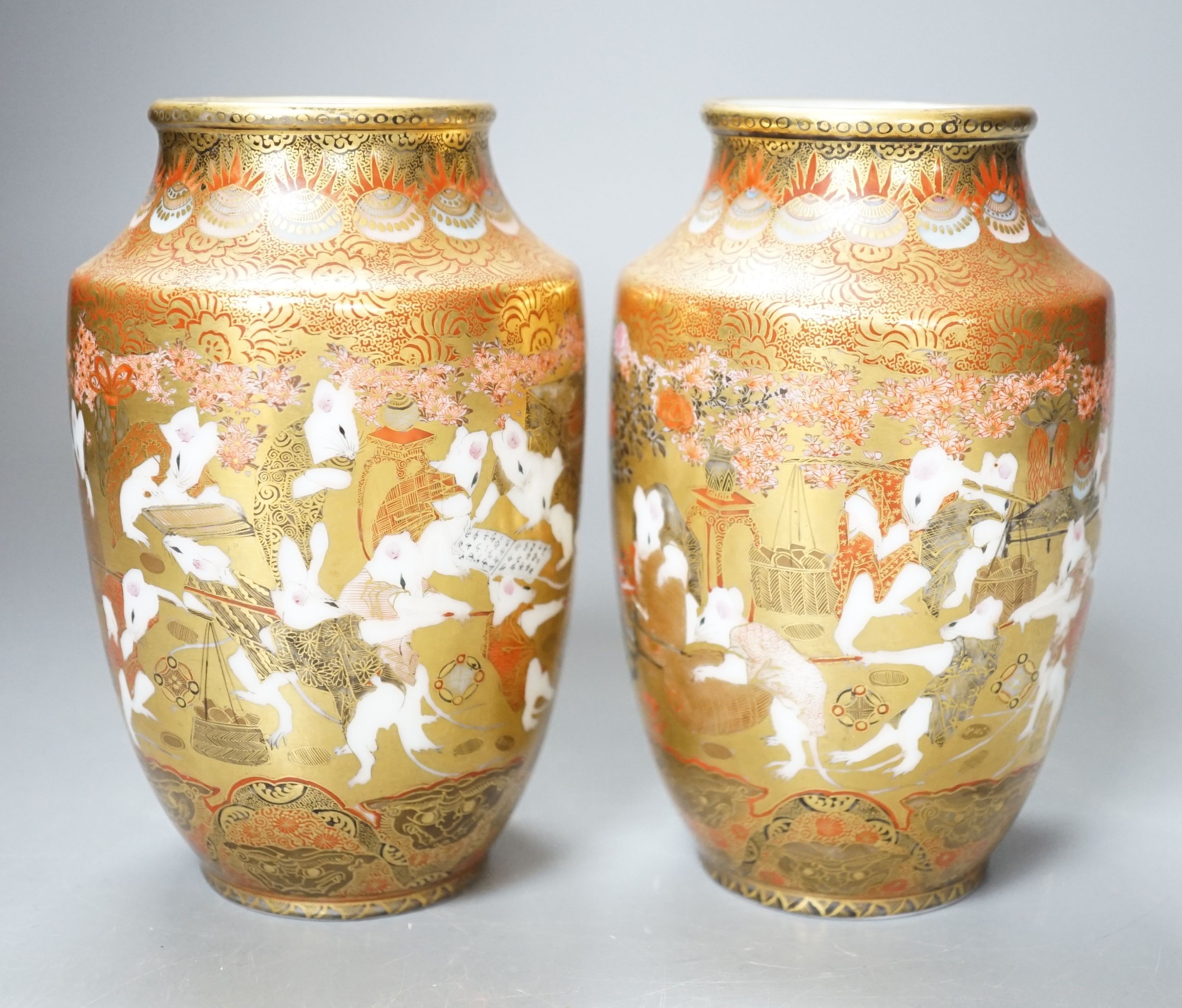 A pair of Kutani type porcelain vases, height 15 cms.